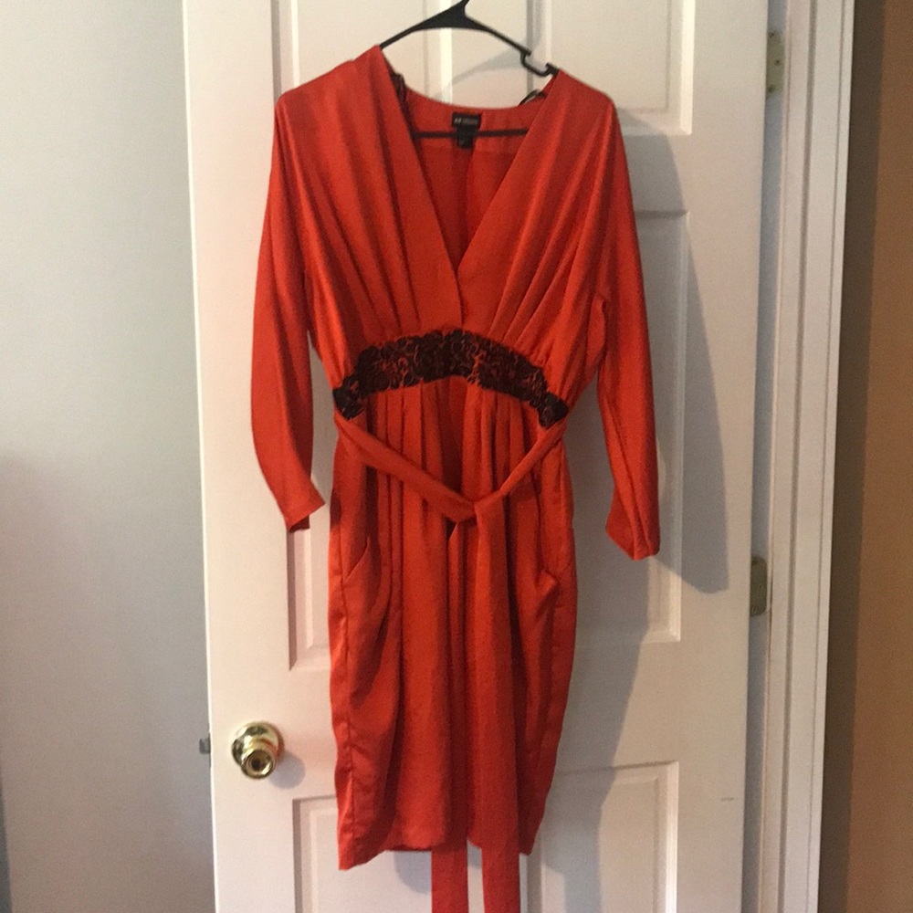 Red satin dress with black details